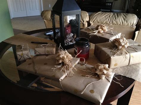 Presents Wrapped In Brown Paper And Tied With Twine Are Sitting On A