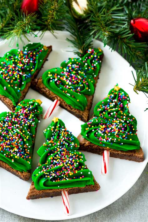 Double decker triple stuffed christmas brownies layered with chocolate and vanilla, and filled with three kinds of candy, stuffed christmas brownies are an easy and impressive treat to make for a crowd. Christmas Tree Brownies - Dinner at the Zoo