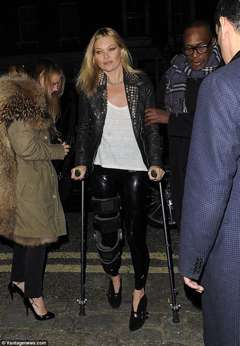 Kate Moss Wears Latex Leggings And Heels To Party While On Crutches
