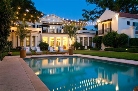 Our picks for best pool lights. Backyard Pool With Strand Lighting | HGTV