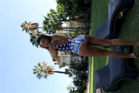 smoking hot melena maria rya posing in an american swimsuit outdoors photos