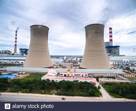 Skyline And Huge Cooling Tower In Power Plant Stock Photo Alamy