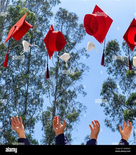 Graduation Cap Throwing Hands Hi Res Stock Photography And Images Alamy