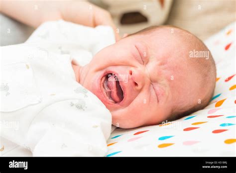Newborn Baby Screaming In Pain With Colics Stock Photo Alamy