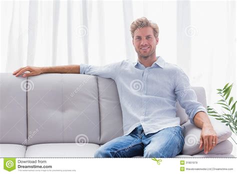 Man Sat On A Couch In The Living Room Stock Image Image Of Abode Couch