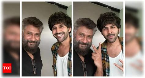 vivek agnihotri poses with kartik aaryan says they are small town outsiders who made it on
