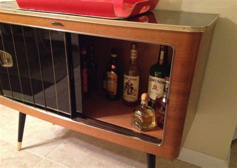 Most cabinets come with only one or two shelves, leaving a lot of wasted space. How to Build a DIY Bar Cabinet