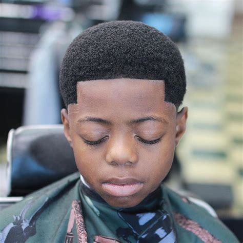 More new haircuts are becoming popular while other old classic haircut styles are also finding their way back into the fashion. Boy Short Afro - MENHAIRDOS