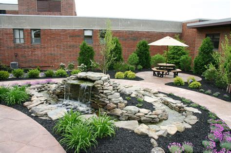 Water Feature At Hospital Healing Garden Dedicated For Former Rock