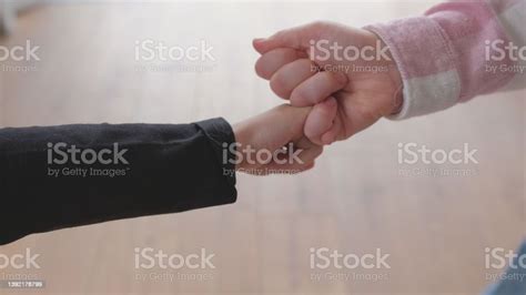 Caucasian Kids Making Pinky Swear Promise Gesture With Fingers Stock
