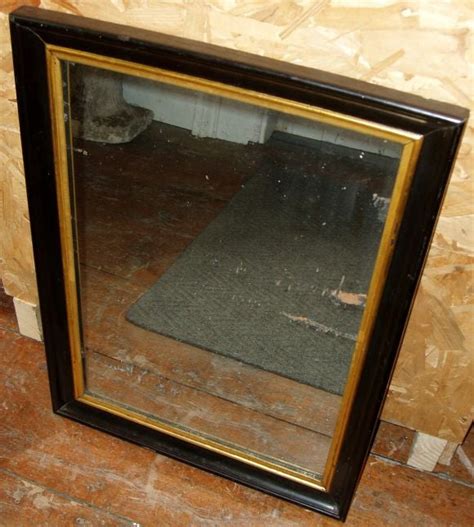 If you are looking for what is, arguably, one of the most basic mirrors on the. Black Framed Mirror with Gold Trim at 1stdibs
