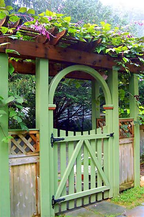 Steel tanks double garage door (with electrics). 15 Inspired Garden Gates That Will Beautify Your Backyard | Unique gardens, Garden arbor, Garden ...