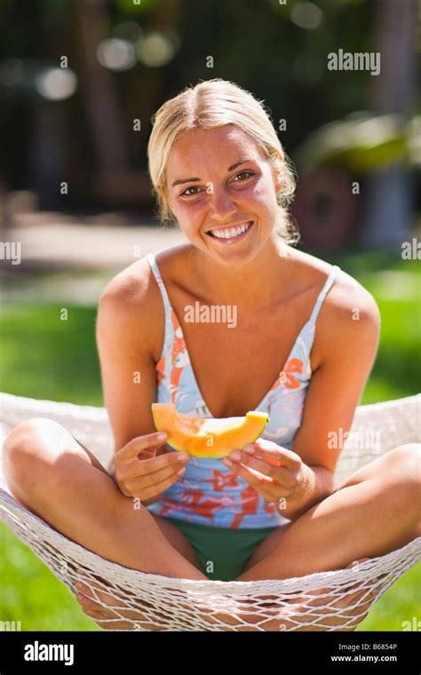 Woman Eating Cantaloupe Photo Stock Alamy