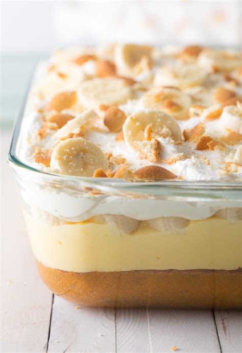 Layers of homemade vanilla bean custard, freshly whipped cream, and nilla wafers. Layered Banana Pudding Cake - A Spicy Perspective