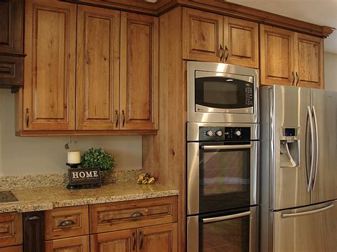 Both base cabinets and wall cabinets can be designed in such a way as to take up less space. LEC Cabinets: Rustic Cherry Cabinets