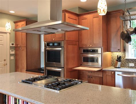Get expert advice on what to ask for when planning your look. island cooktop | Island cooktop and oven cabinets beyond ...