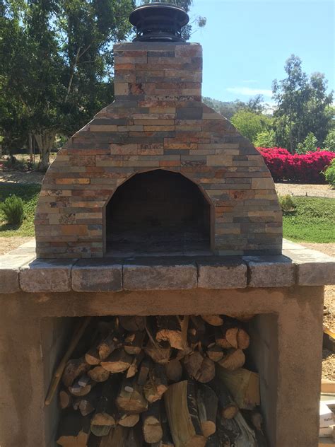 Buy a fantastic wood fired pizza oven and accessories. The Cochrane Family Wood-Fired Outdoor Pizza Oven in ...