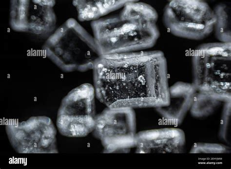 Crystal Sugar Close Up On Black Background Under The Light Microscope