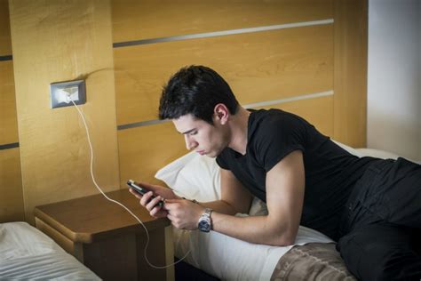 Is Charging A Phone In Bed A Fire Risk Readers Digest