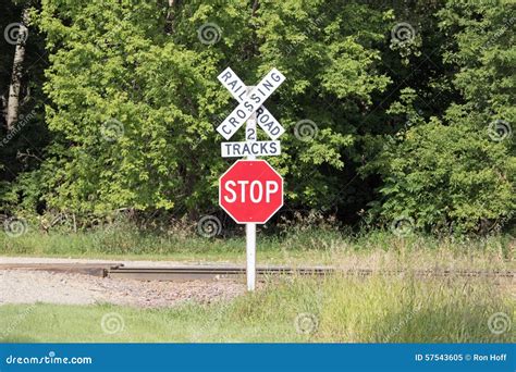 A Stop Sign At A Railroad Crossing Stock Image Image Of Signs Track
