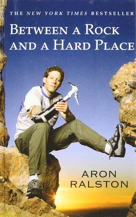 Between A Rock And A Hard Place Aron Ralston 9781439508725 Amazon