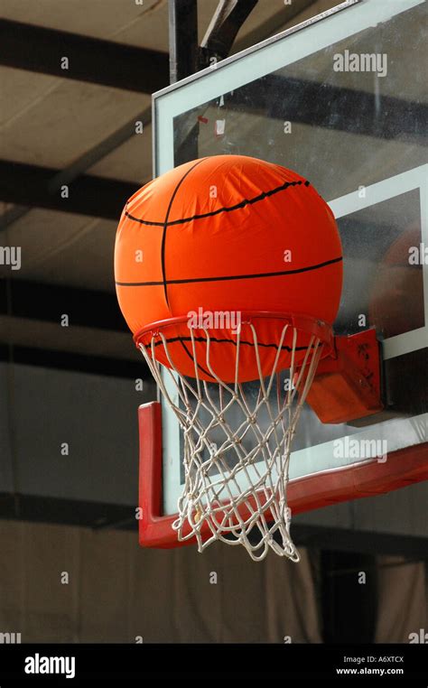 Inflatable Basketball Gets Stuck In Basket At Youth Center North