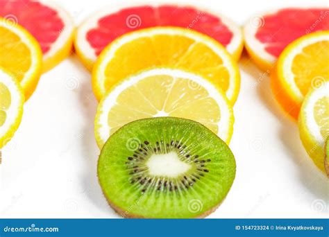 Close Up Of Citrus Slice Kiwi Oranges And Grapefruits Isolated On