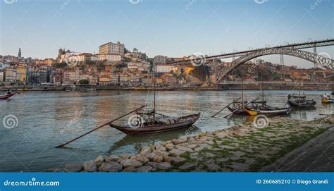 Panoramic View Of Douro River With Traditional Rabelo Boats Ribeira