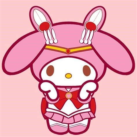 Hello Kitty Is Wearing A Pink Outfit With Ears