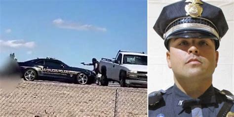 new mexico police officer gets up fires back after shot by accused cop killer video shows