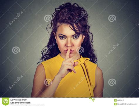 Secretive Woman With Finger On Lips Asking Shh Quiet Stock Image