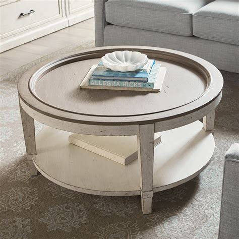 A Coffee Table With A Book On Top