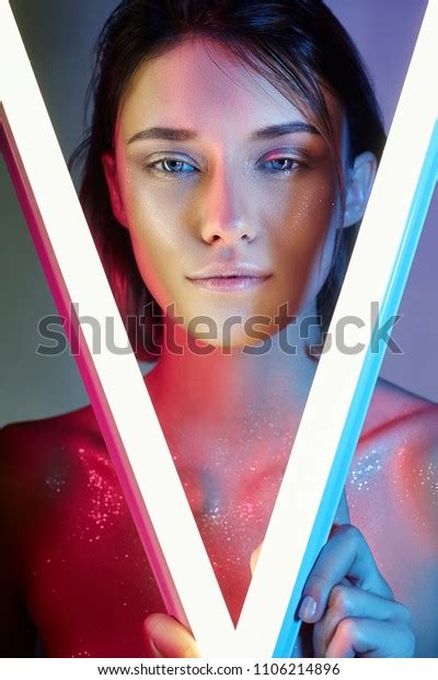 Sexy Woman In Neon Light In Lingerie Neon Lights And Glare Of Light On The Girl S Face Naked