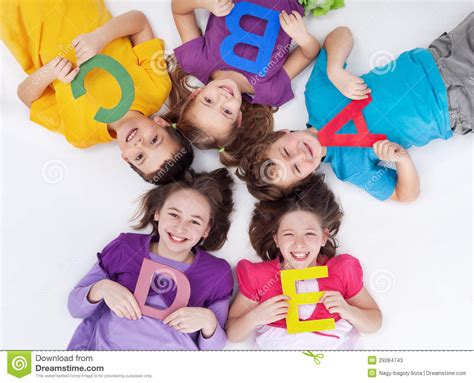 Happy School Kids With Colorful Alphabet Letters Stock