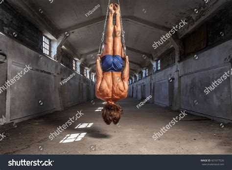 Man Hanging Upside Down On Gimnastic Stock Photo 421677526 Shutterstock