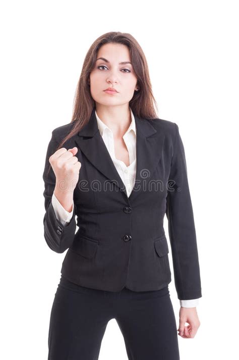Young Successful And Powerful Business Woman Showing Fist Stock Photo