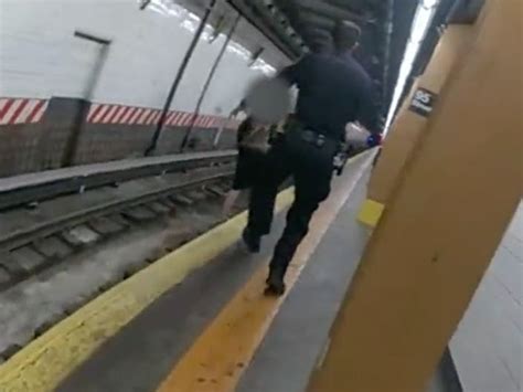 video woman passes out falls onto subway tracks before nypd rescue new york city ny patch