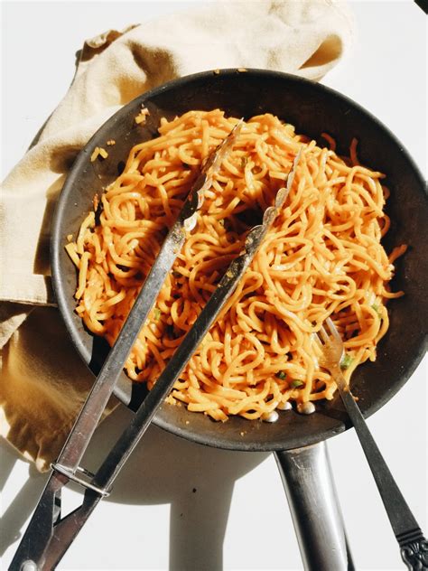 Sweet And Spicy Chili Garlic Noodles Standing In The Kitchen