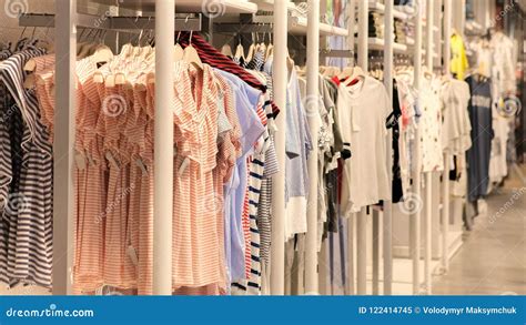 Dress In The Store Fashion Clothing On Hangers At The Shop Stock Image