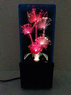 Fiber optic flower lamp with music box that a girfriend bought for me at a mall in new york in the early 1990's.it's been in my basement collecting dust my fiber optic starting collection.this is a fiber optic flower music box case made in the 1980's there are different kinds of cases,and flowers. Flower Fiber Optic Light | The Baby Einstein Toy Wiki | Fandom