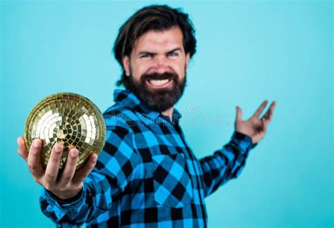 Handsome Guy Hipster With Moustache And Beard Hold Disco Ball Dance