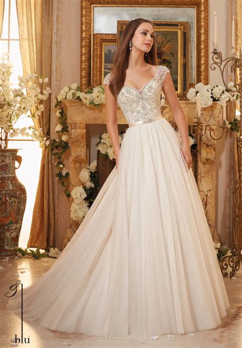 Wedding Gowns By Blu Featuring Crystallized Embroidery On