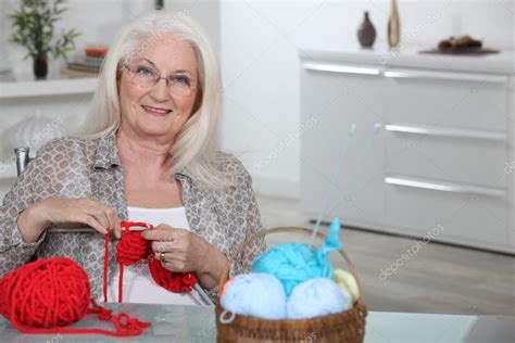 Old Lady Knitting In Kitchen Stock Photo By ©photography33 8065389