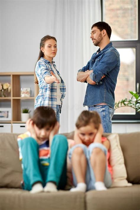 Sad Children And Parents Quarreling At Home Stock Image Image Of