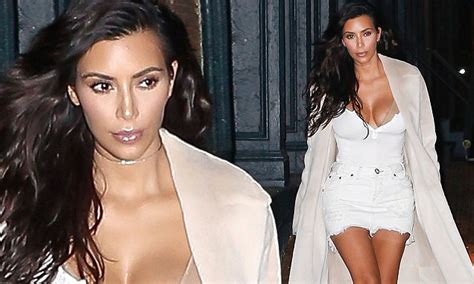 Kim Kardashian Puts On Eye Popping Display In Plunging Top With Kanye West Daily Mail Online