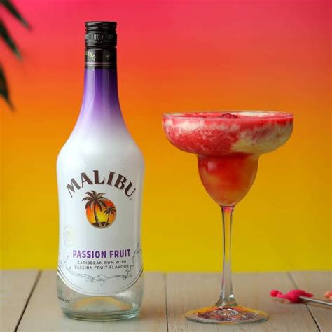 The already tropical malibu has been given a fruity kick in this passion fruit expression! Passion Fruit & Raspberry Daiquiri in 2020 | Rum drinks ...