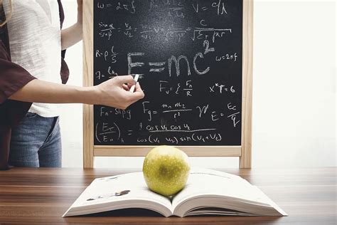 Teacher Teaching Writes Mathematical Equations Blackboard