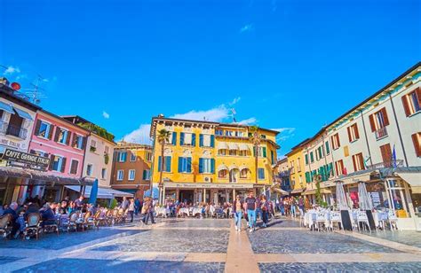 The Scenic Houses And Outdoor Cafes On Piazza Giosue Carducci Sirmione