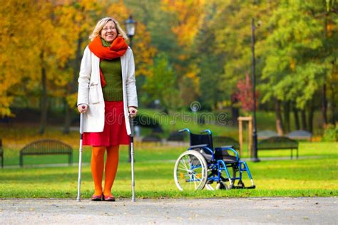 Woman Practicing Walking On Crutches Stock Photo Image Of Disability