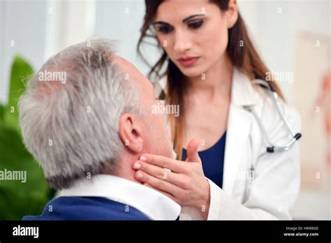 Doctor Checking The Lymph Nodes Size Of Her Patient Stock Photo Alamy